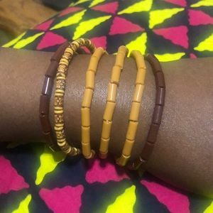 These are handmade brown and tan bracelets. One for $10